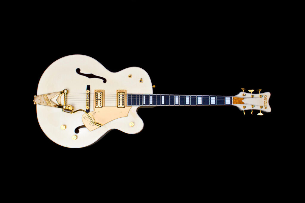Gretsch White Falcon hollow body electric guitar.