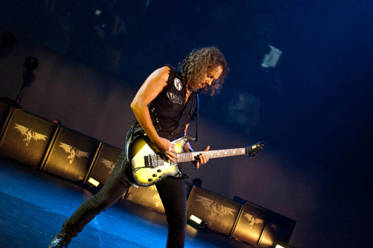 Kirk Hammett of Metallica wielding a strat-style ESP on stage in 2011.