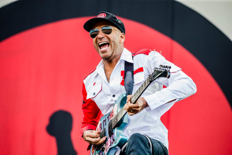 Guitarist Tom Morello of Rage Against the Machine in front of a red background during a performance at the Dutch annual Pinkpop Festival in Landgraaf.
