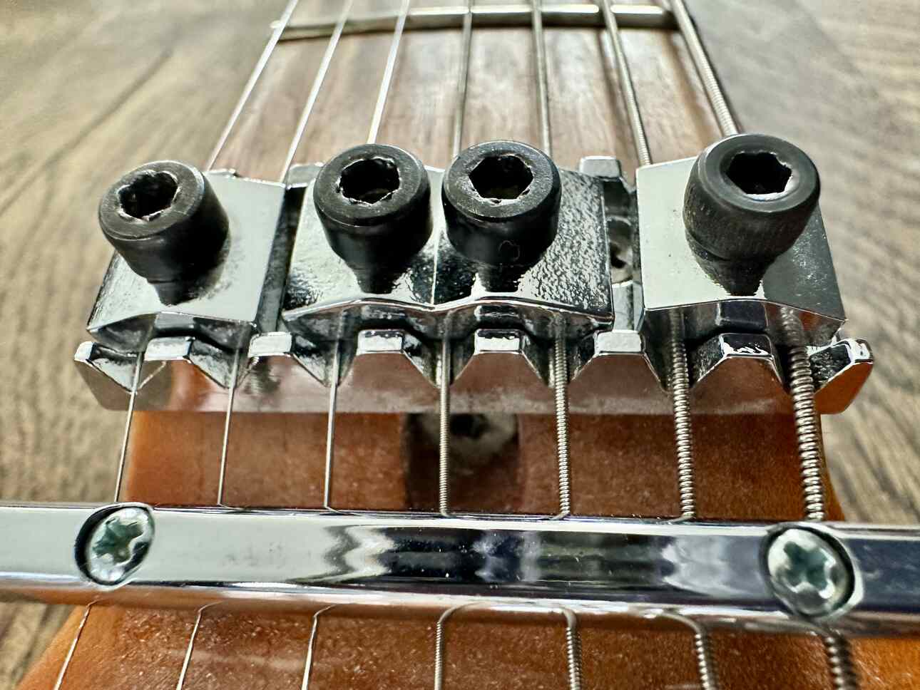 Closeup of a truss rod in the neck of a Suhr Modern 7-string Electric Guitar.