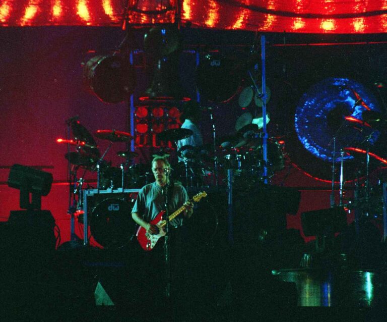 David Gilmour playing a red Fender Stratocaster live during the 1994 Division Bell Tour.