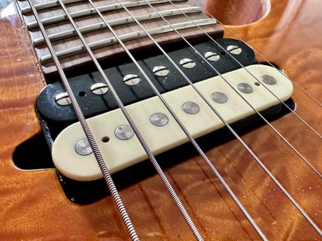 Suhr hot humbucker pickup on a Suhr seven string guitar.