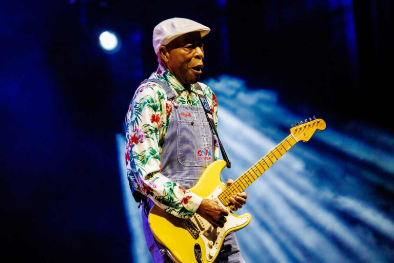 Buddy guy playing his yellow Fender Stratocaster live on stage in Rotterdam, the Netherlands.
