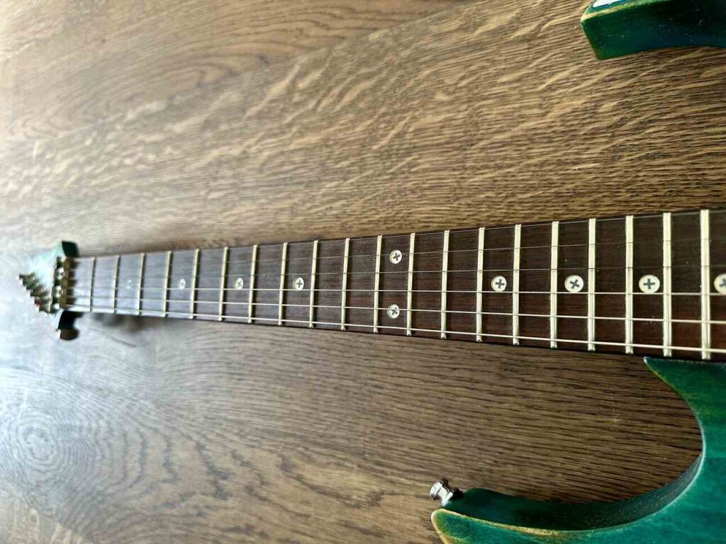 Tapered neck on an Ibanez Industrial Jem BSB electric guitar.